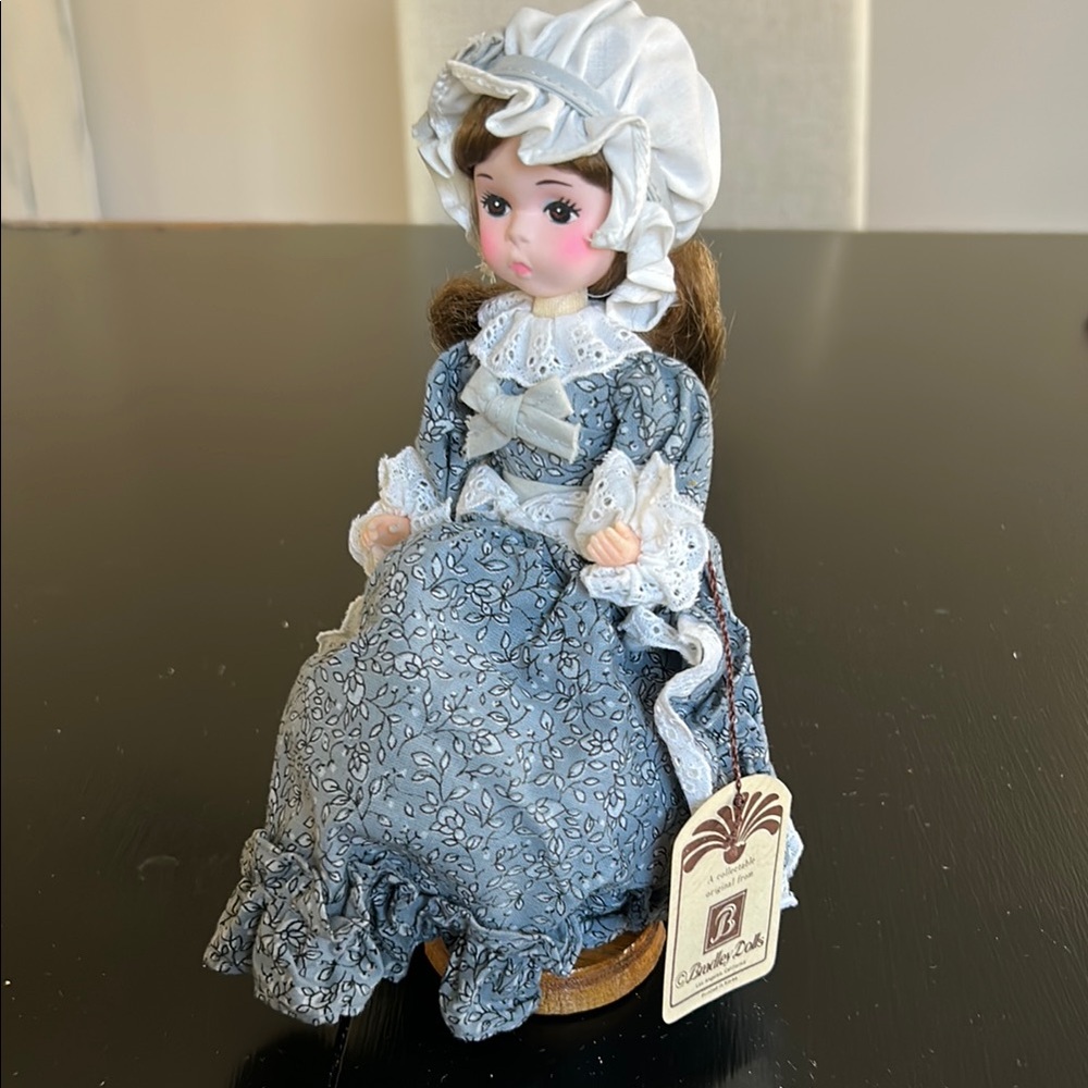 Blue Porcelain Doll with Bonnet